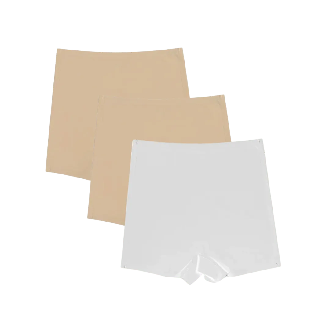 Shorts Segunda Pele nas cores bege e branco, com design sem costura, proporcionando um ajuste perfeito e conforto duradouro. Ideal para uso diário, oferecendo discrição sob qualquer roupa.
