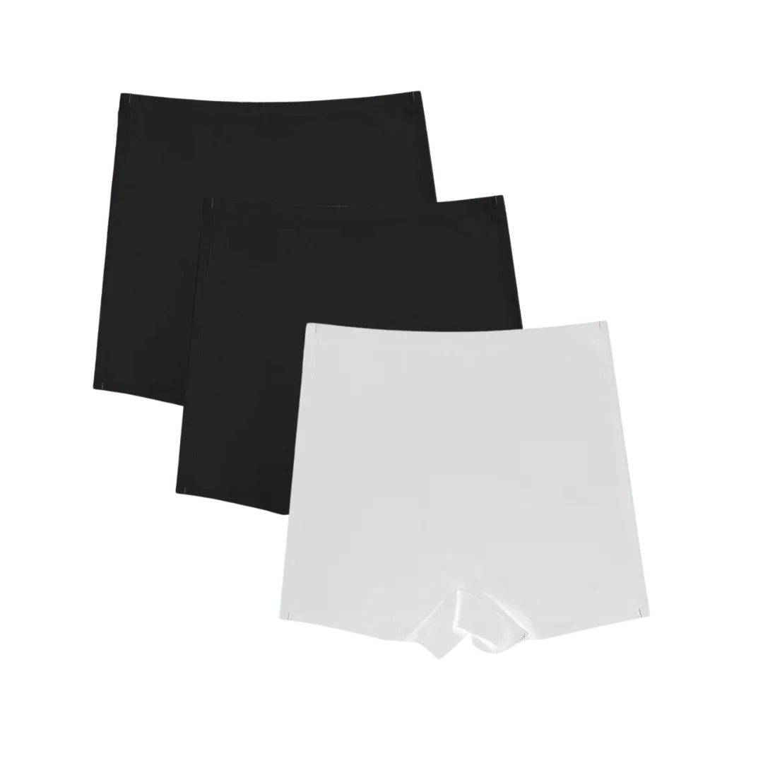 Shorts Segunda Pele nas cores preto e branco, com design sem costura e ajuste confortável. Perfeito para o dia a dia, oferecendo discrição e suporte sem marcar sob a roupa.