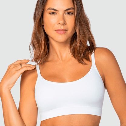 Mulher usando sutiã sem costura Cygnuss x Lupo, lingerie feminina confortável, tecido respirável, oferece sustentação e conforto.