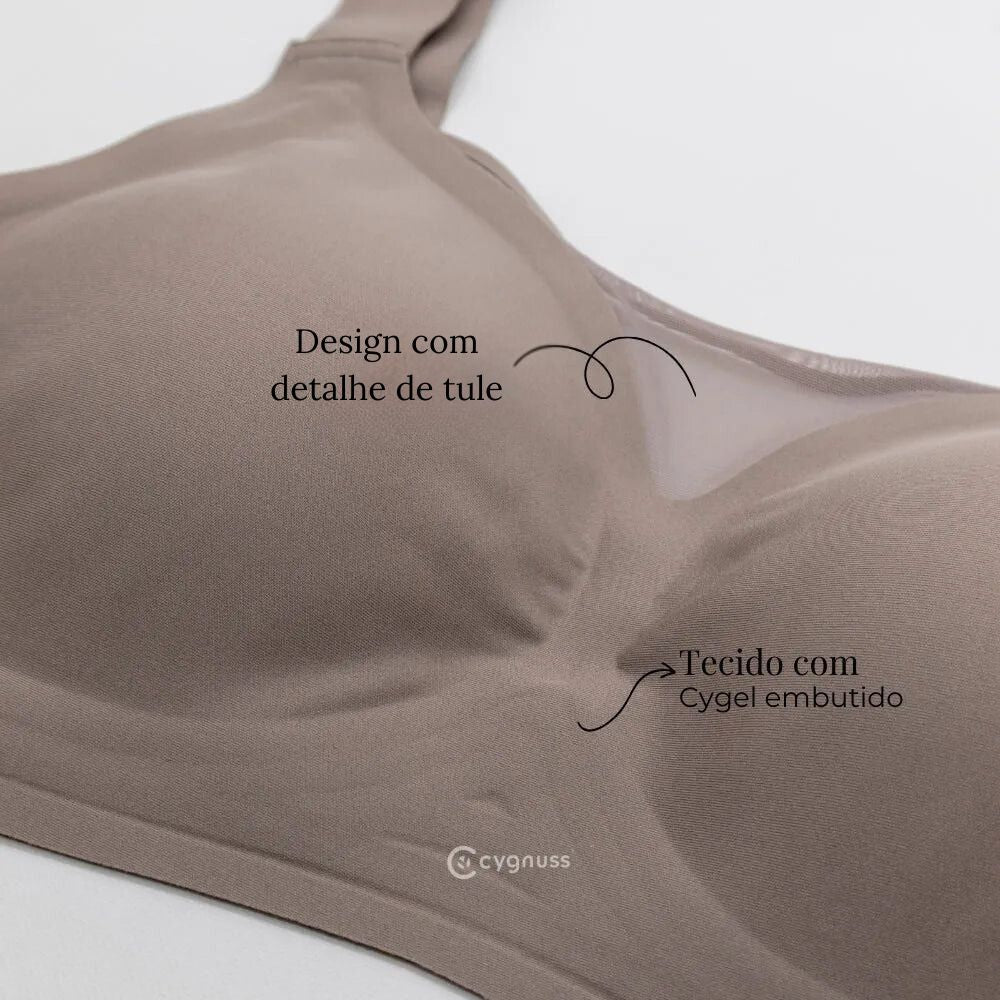 Detalhe do sutiã Cygnuss destacando o tecido com Cygel embutido para maior suporte e conforto, além do design sofisticado com tule no decote para um toque elegante.