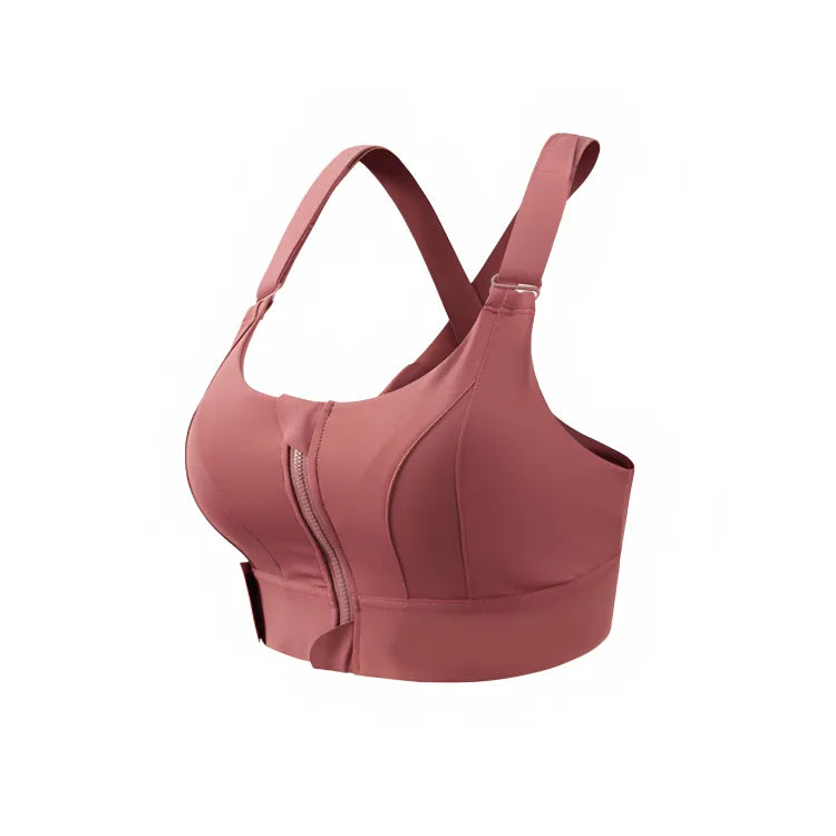 Desenvolvido com um tecido leve, macio e respirável, que se adapta perfeitamente ao seu corpo sem marcar na roupa. A inovação do zíper frontal proporciona praticidade ao vestir e ajustar, permitindo um encaixe perfeito. Com alças largas e aveludadas que oferecem sustentação sem comprometer o conforto dos ombros. O design em decote "U" valoriza seu busto, enquanto os ajustes em velcro nas alças e abaixo dos seios garantem um ajuste personalizado.