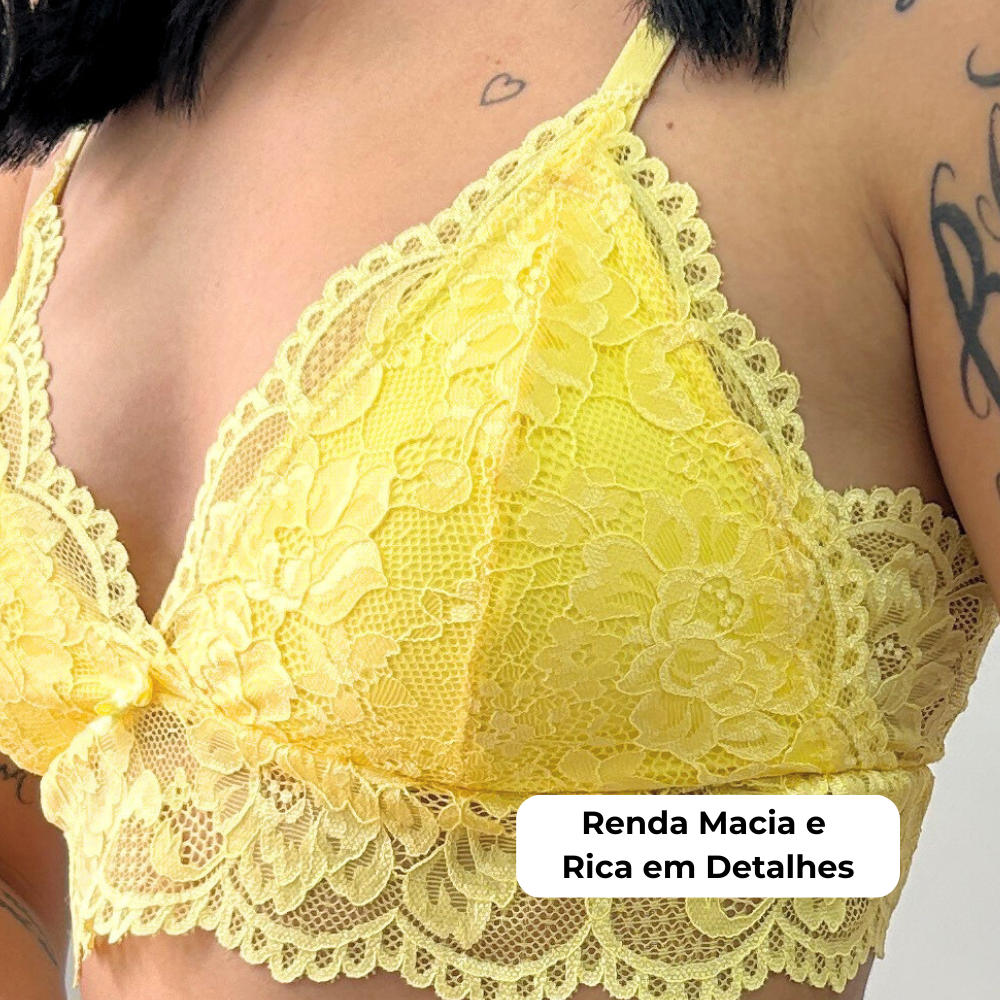 Imagem em close do Sutiã Aurora Cygnuss na cor amarela, destacando a renda macia e cheia de detalhes refinados.
