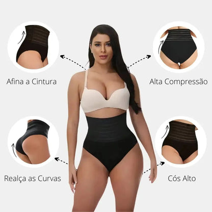 Imagem de uma mulher usando uma calcinha modeladora tanga com faixa de cinta modeladora na região abdominal. O produto oferece conforto, com uma modelagem que proporciona efeito de compressão suave para uma silhueta mais definida. A peça é de cor neutra e combina com a linha de roupas íntimas de modelagem, evidenciando o design inovador.