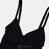 Imagem detalhada do Body Elegance Modelador na cor preta, mostrando a área do bojo com alças ajustáveis e tecido suave, destacando seu design confortável e elegante.