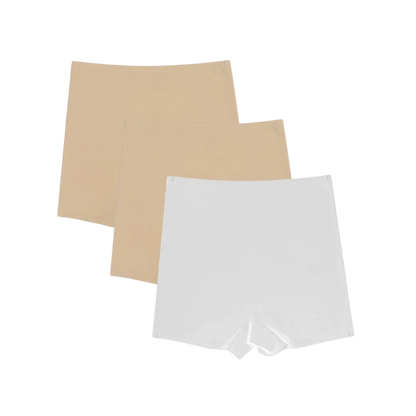 Shorts Segunda Pele nas cores bege e branco, com design sem costura, proporcionando um ajuste perfeito e conforto duradouro. Ideal para uso diário, oferecendo discrição sob qualquer roupa.