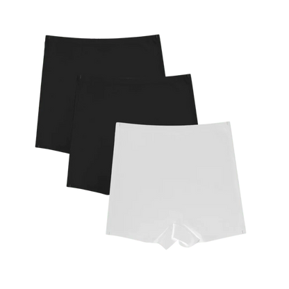 Shorts Segunda Pele nas cores preto e branco, com design sem costura e ajuste confortável. Perfeito para o dia a dia, oferecendo discrição e suporte sem marcar sob a roupa.