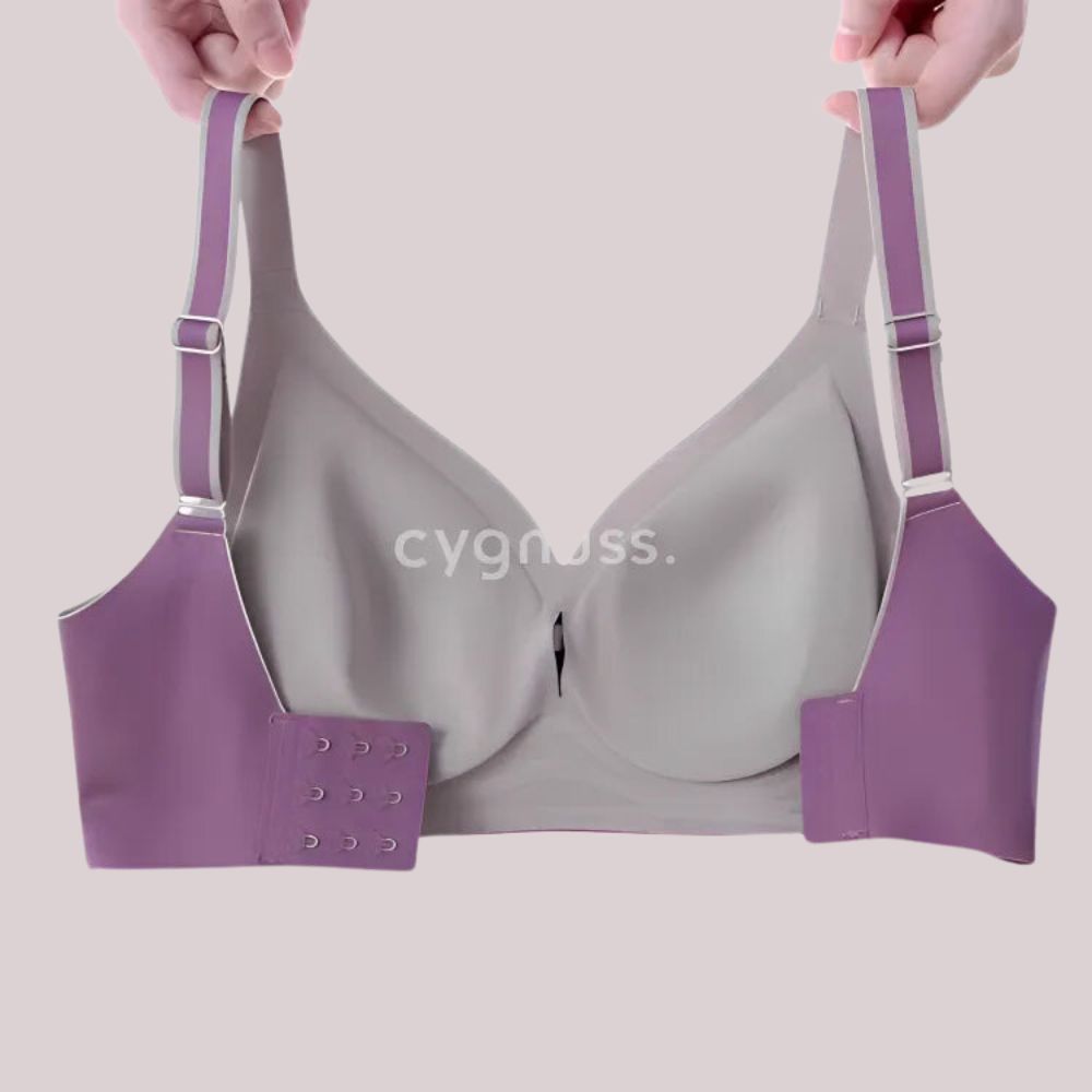 Sutiã Cygnuss com alças ajustáveis e fecho removível, mostrando a versatilidade do produto, em cores cinza e roxo.