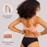 Mulher vestindo sutiã com alças ajustáveis e fechamento com 4 opções. Sutiã confortável, sem costura e invisível.
