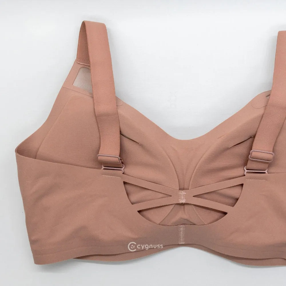 Sutiã esportivo Cygnuss com design elegante e moderno, apresentando alças cruzadas e ajuste confortável para o busto. Perfeito para quem busca estilo e suporte durante o dia a dia.