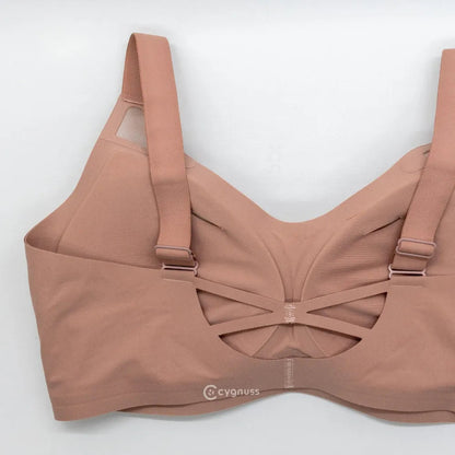 Sutiã esportivo Cygnuss com design elegante e moderno, apresentando alças cruzadas e ajuste confortável para o busto. Perfeito para quem busca estilo e suporte durante o dia a dia.